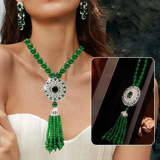 Emerald colored necklace with a stylish pendant